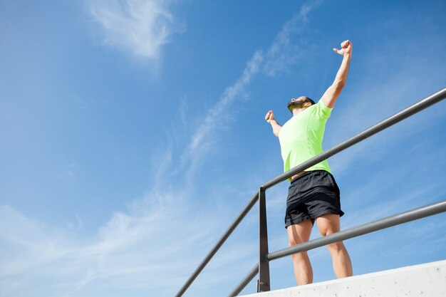 Cheerful Strong Man Celebrating Sport Success