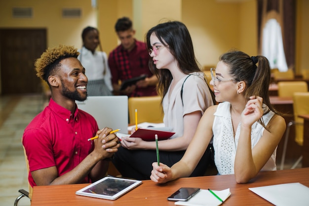 Cheerful students communicating