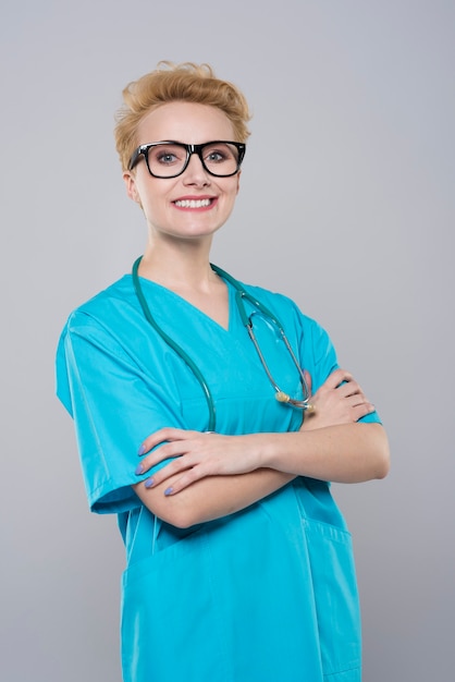 Cheerful surgeon in her uniform