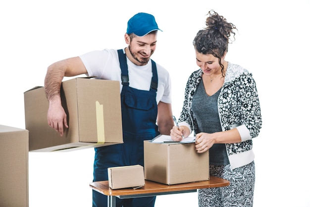 Free photo cheerful woman and courier with parcels