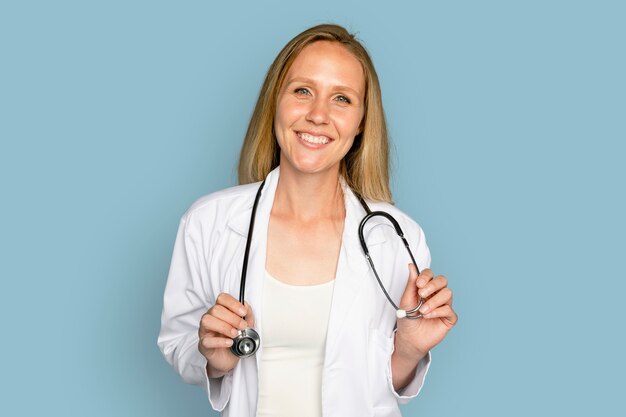 Free photo cheerful woman doctor using stethoscope