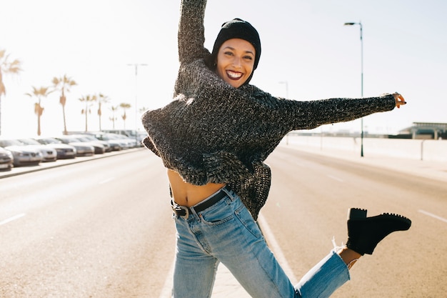 Cheerful woman in harbor area