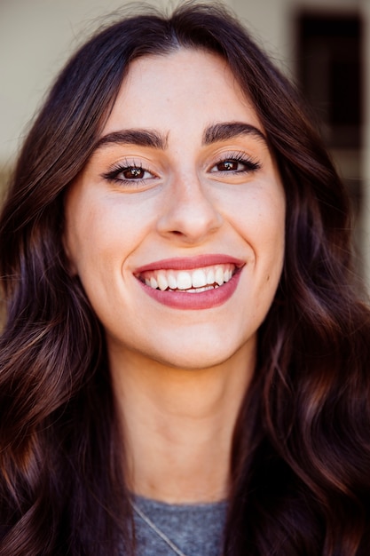 Cheerful woman looking at camera