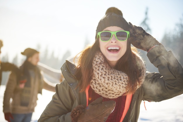 Free photo cheerful woman in warm clothes