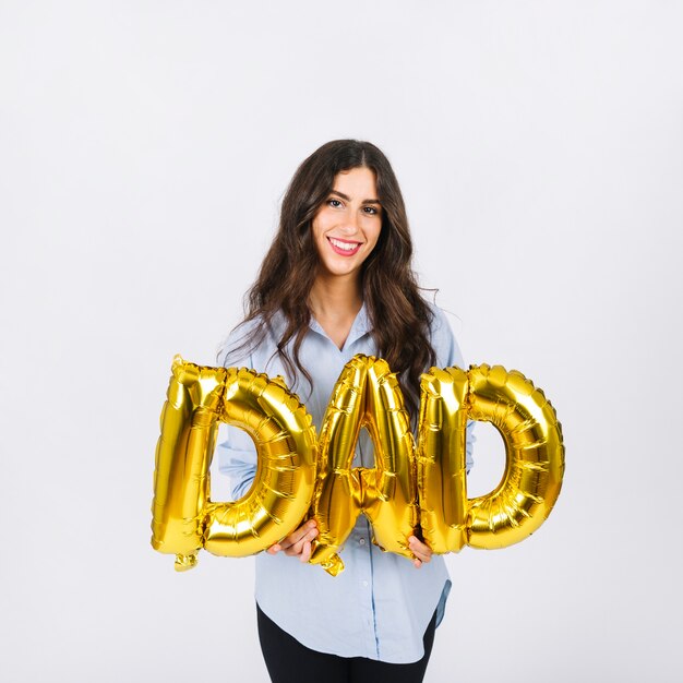 Cheerful woman with dad writing