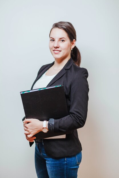 Cheerful woman with folder