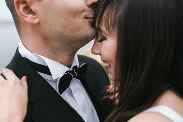 Cheerful woman with groom