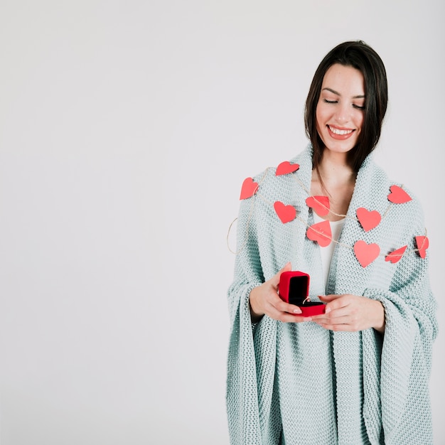 Cheerful woman with ring