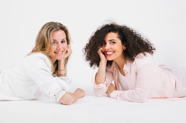 Cheerful women looking at camera