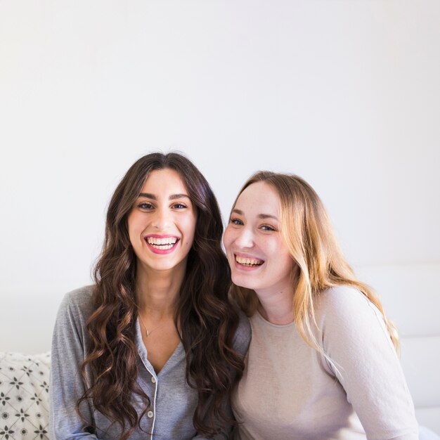 Cheerful women in pajamas