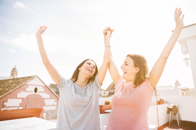 Cheerful women on street