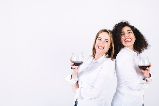 Cheerful women with wineglasses