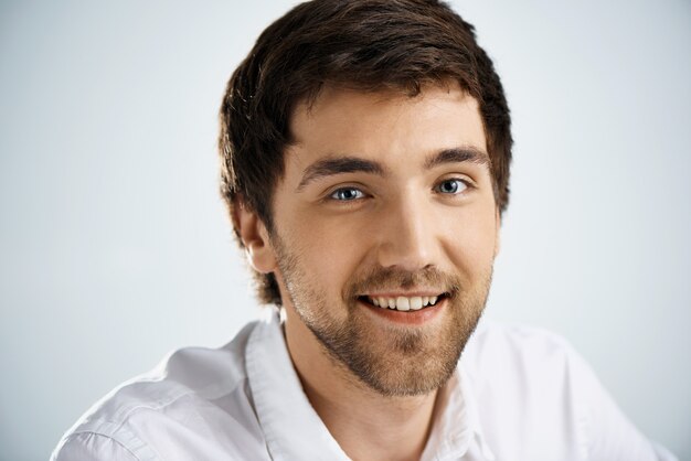 Cheerful young man smiling