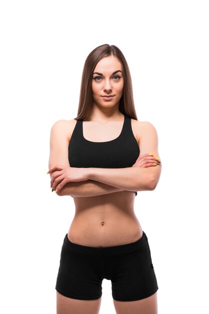 cheerfully smiling mixed race sporty woman looking at camera, isolated on white background