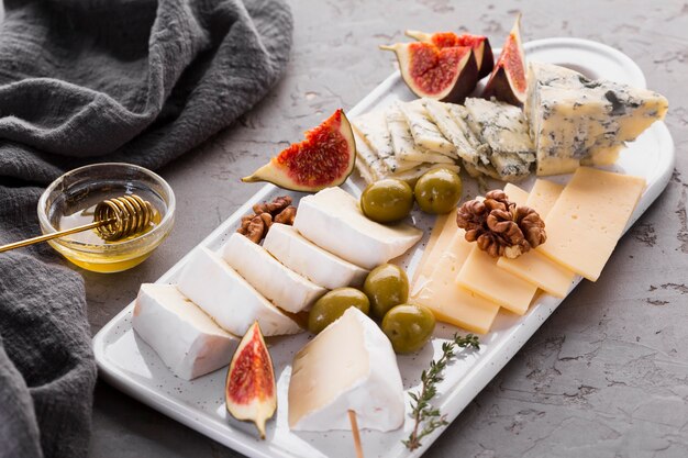 Cheese assortment platter with fig