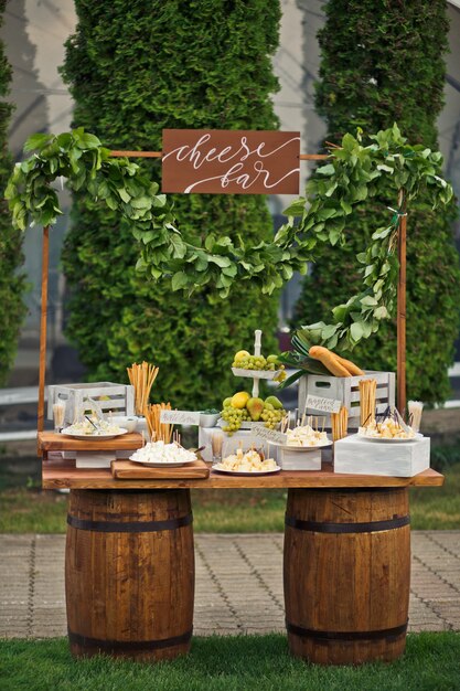 Cheese bar put on two wooden barrels