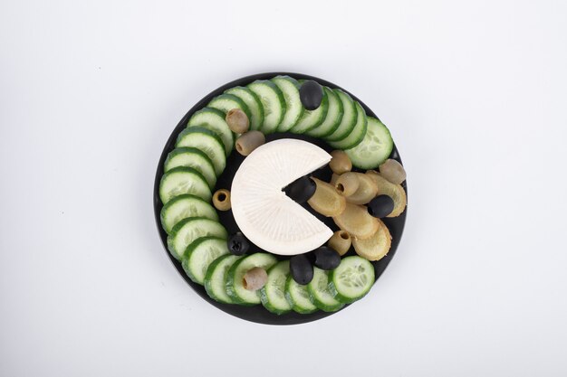 Cheese, cucumber and olive platter. Top view