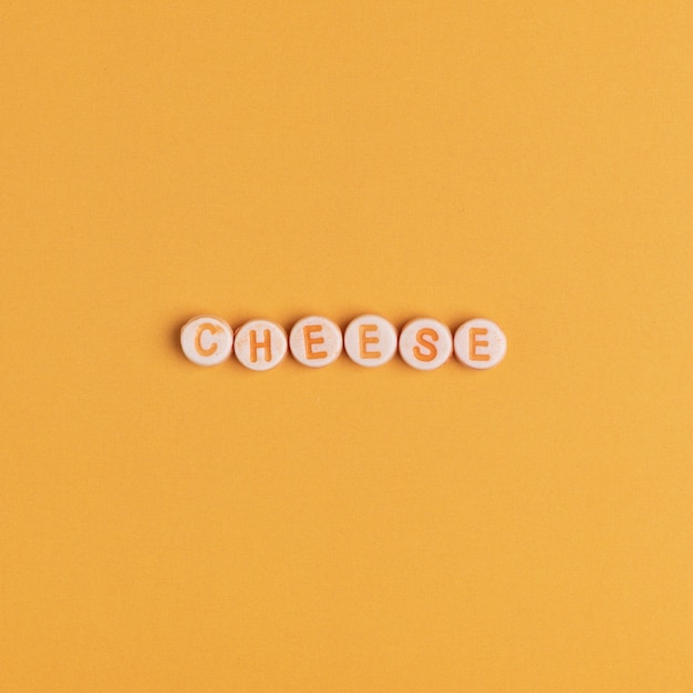 CHEESE word with beads