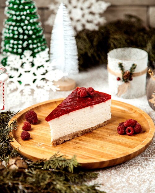 Cheesecake slice topped with raspberry glaze