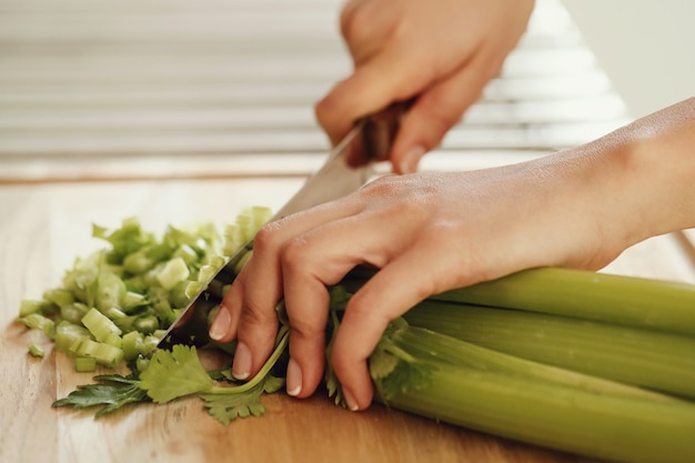 Chef cutting celery