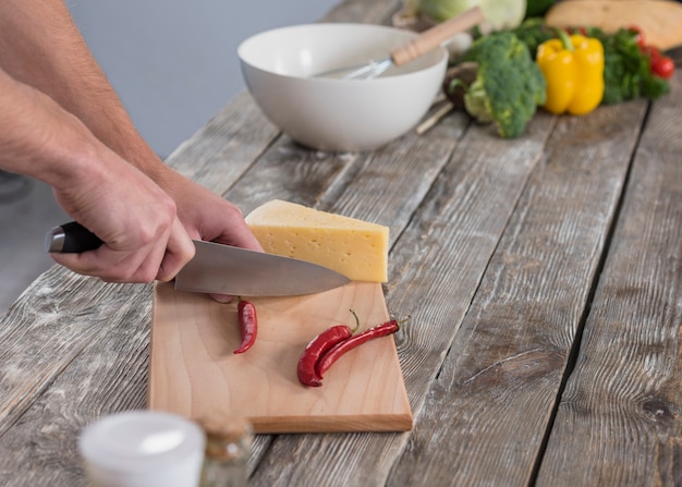 Chef cutting chili