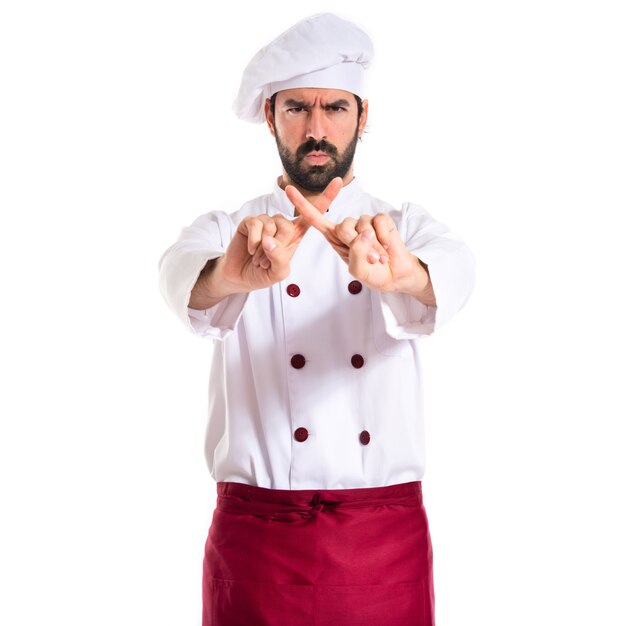 Chef doing NO gesture over white background