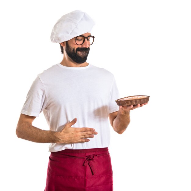 Chef eating a cake