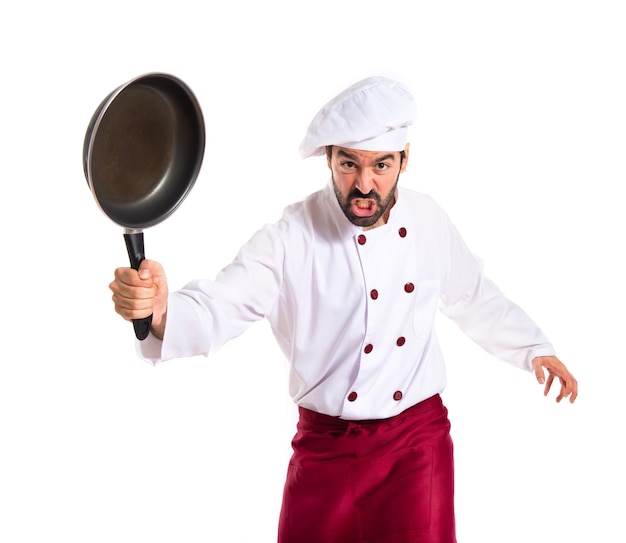 Chef holding frying pan