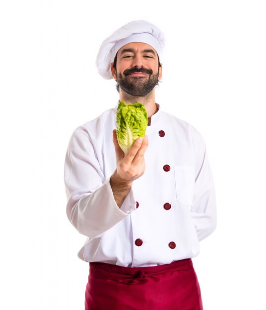 Chef holding a lettuce