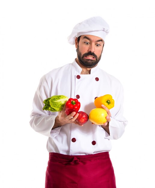 Chef holding vegetables