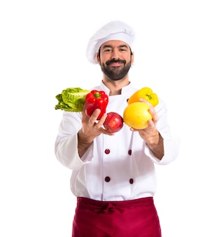 Chef holding vegetables