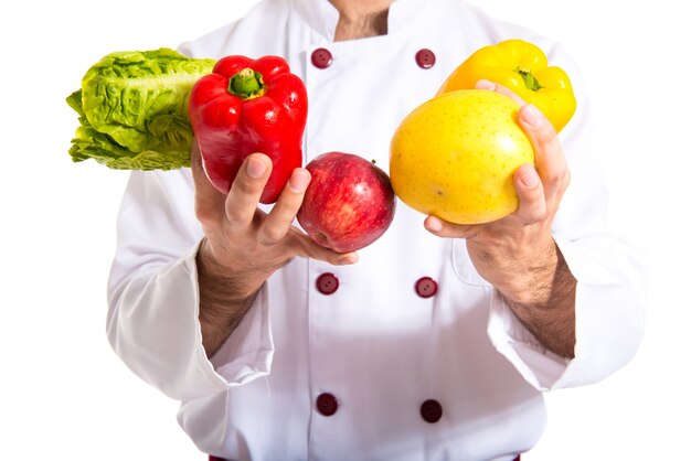 Chef holding vegetables