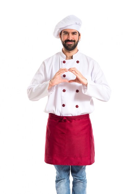 Chef making a heart with her hands