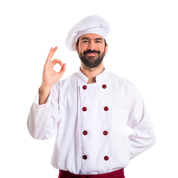 Chef making Ok sign over white background