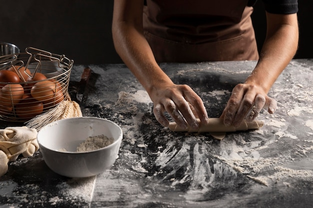 Chef making pastries using dough