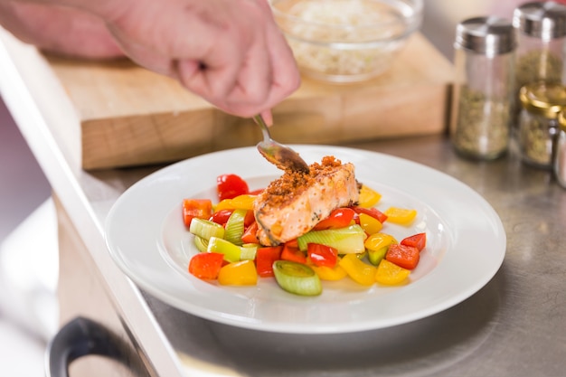 Chef preparing a dish of healthy food