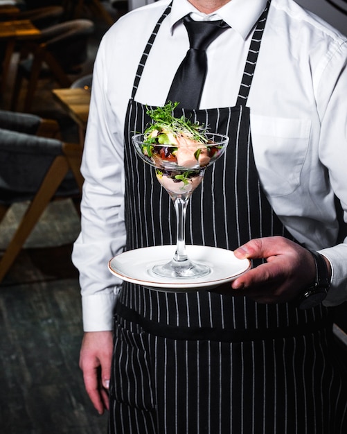 Free photo chef presents salad in a glass