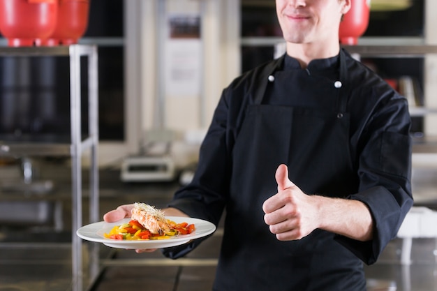 Chef showing his dish