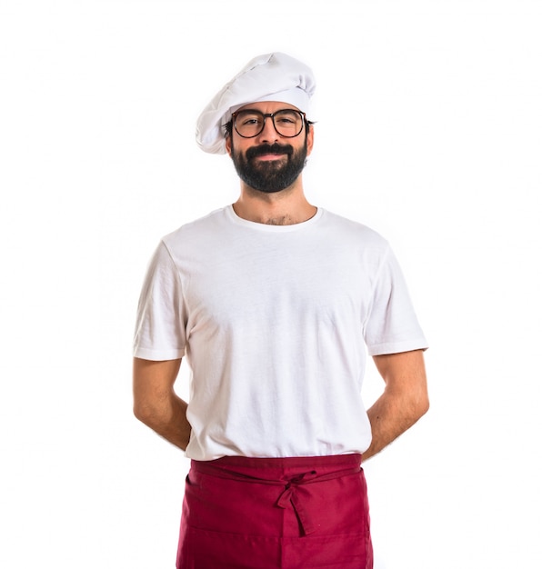 Chef smiling over white background