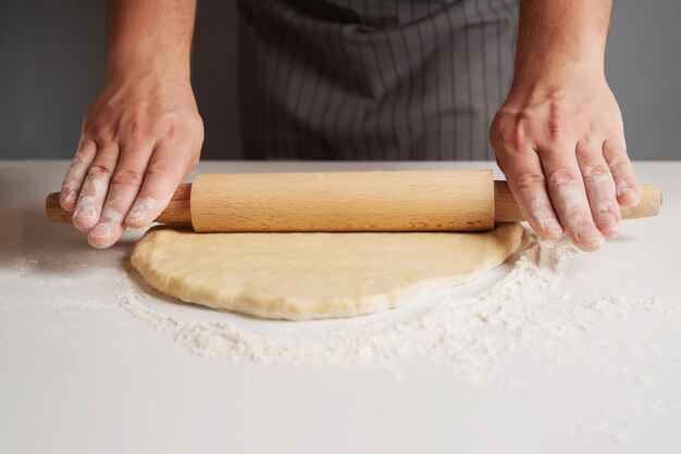 Chef stretching the dough