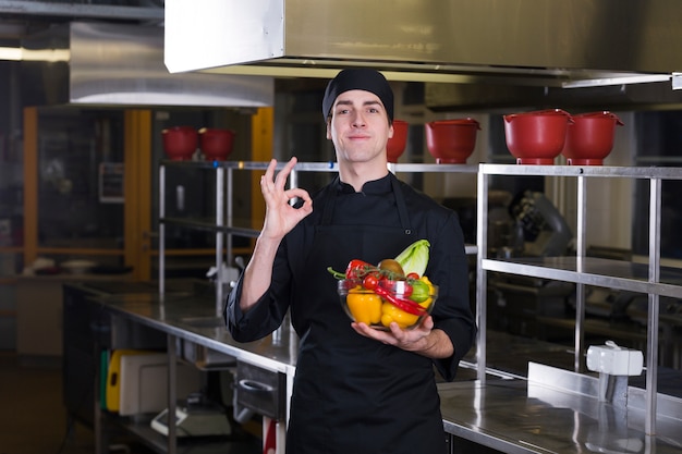 Free photo chef with fruits and vegetables