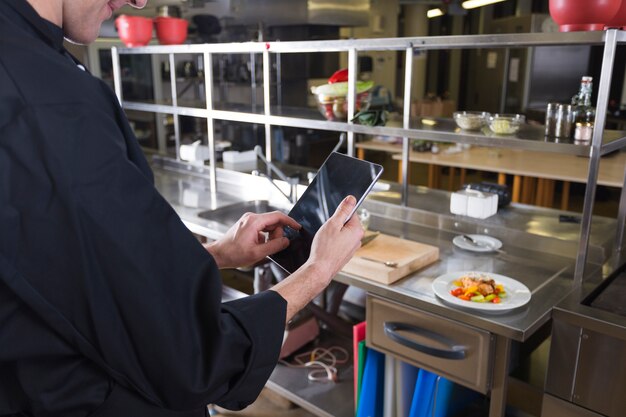 Chef with a tablet