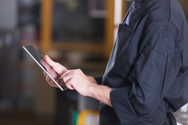 Chef with a tablet