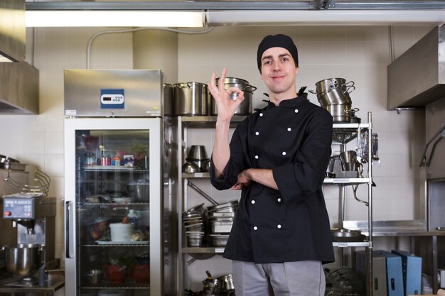 Chef with uniform and utensil kitchen