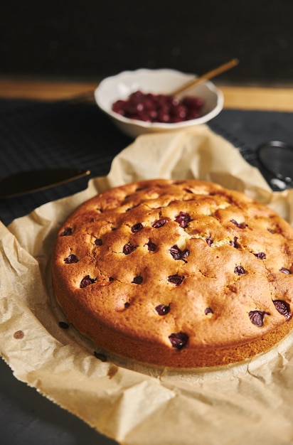 Free photo cherry cake with sugar powder and ingredients