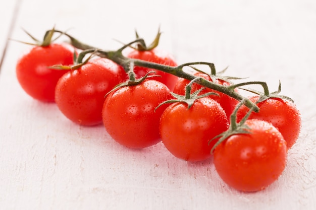 Cherry tomatoes on a branch