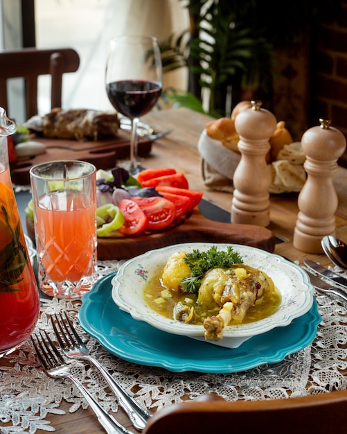 Chicken bozbash with vegetables on the table