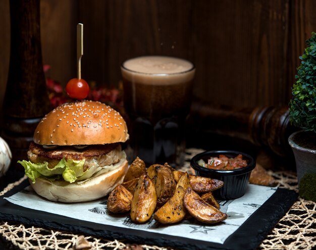 Chicken burger with side homemade fried potato