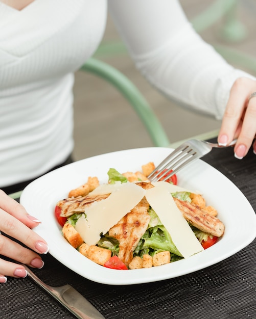 Chicken caesar salad in the plate