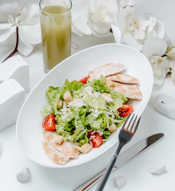 Chicken caesar salad on the table